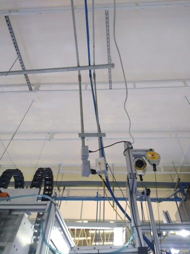Overhead network cabling installed above the line